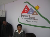 talking with members of Banco Comunitario Alucouho