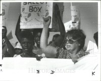ACORN President Elena Hanggi leads marchers.Rep National Convene Dallas, Republicans in 1984.