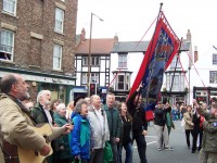 Billy Bragg singing with 'Cotia Pit folk group at Durham Miners Gala, a 120-year-old festival in which mining communities from all over County Durham (the largest coalfield in Britain; there have been 218 pits in Durham County over the years) march with banners and bands to the centre of the town 2004.
