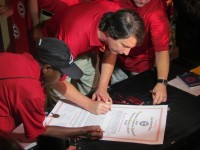 Employees of the Mercedes-Benz plant in Vance, Ala. sign up to be the first members of a new, local UAW union at the Hotel Capstone in Tuscaloosa. (Stephen Dethrage | AL.com)