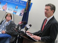 Photo by Dave Ranney Kansas Department for Children and Families Secretary Phyllis Gilmore looks on as Gov. Sam Brownback discusses a welfare reform measure that will take effect July 1. - See more at: http://www.khi.org/news/article/brownback-says-welfare-reform-aims-to-break-cycles-of-dependency#sthash.HDeRIs2q.dpuf