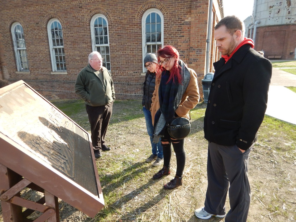 Lloyd Cunningham giving the background to ACORN Canada organizers on the Homestead strike at the plaque