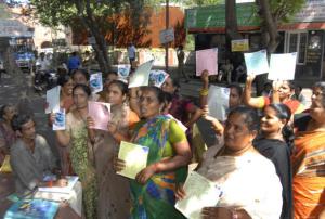 Victims of MFIs display their daily payment cards in Visakhapatnam, Andhra Pradesh. The Reserve Bank of India has appointed a sub-committee to look at governance issues. Photo: The Hindu/C.V. Subrahmanyam