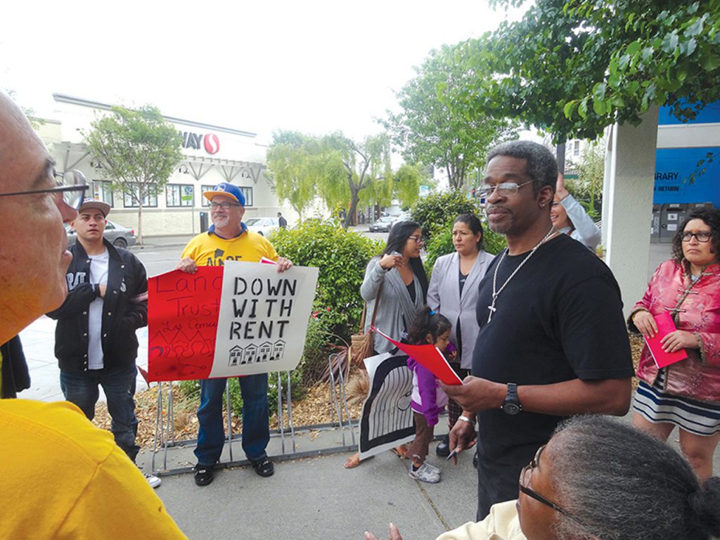 DARWIN BONDGRAHAM - Martin and activists outside of Community Realty's offices in April after delivering a letter requesting a meeting with Marr.