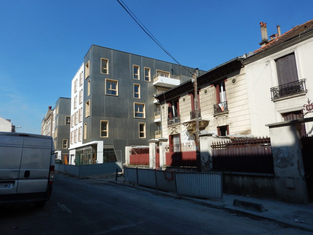 example of french housing scheme -- tearing down old to replace with mixed income
