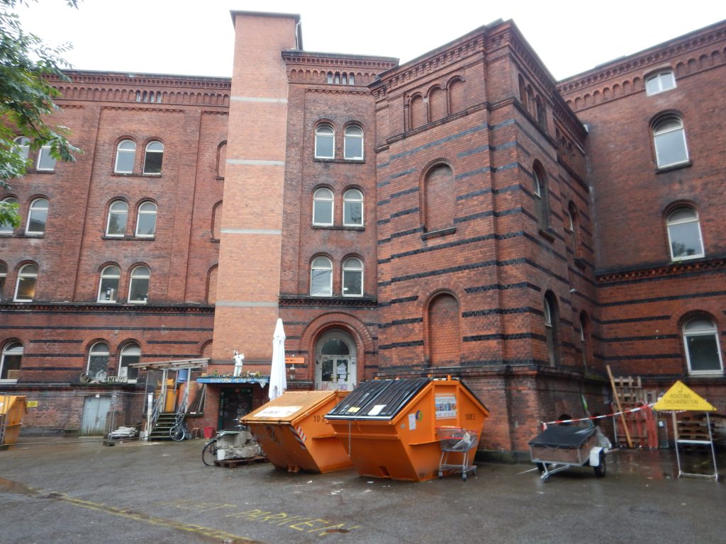 Armory building being converted to community space by the cooperative