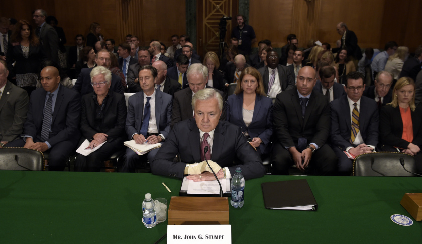 Wells Fargo Chief Executive Officer John Stumpf prepares to testify on Capitol Hill in Washington, Tuesday, Sept. 20, 2016, before Senate Banking Committee. (AP Photo/Susan Walsh)