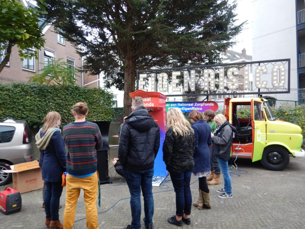 organizers for Netherlands national health care reform campaign against "own risk" admire their crowd magnet