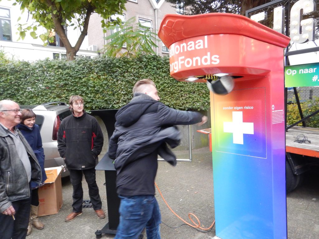 one of the organizers takes a punch at "own risk"