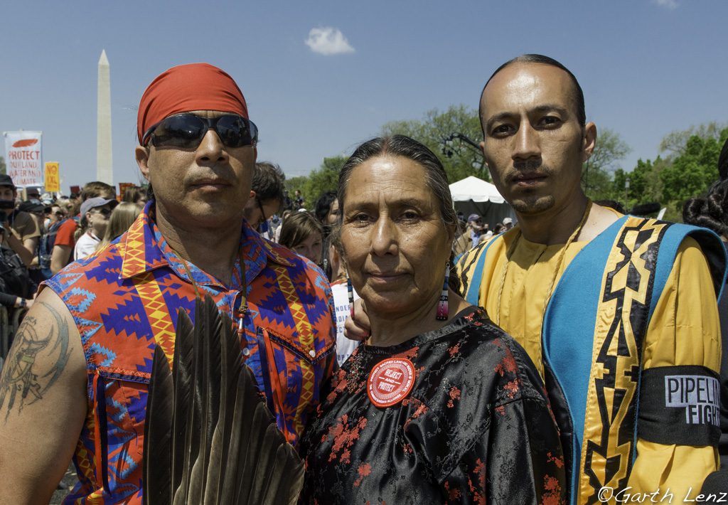 Casey Camp with her two sons (Mekasi Camp-Horinek on the left) at the Reject and Protect event in Washington, DC. (Photo by Garth Lenz for Bold Nebraska and iLCP)